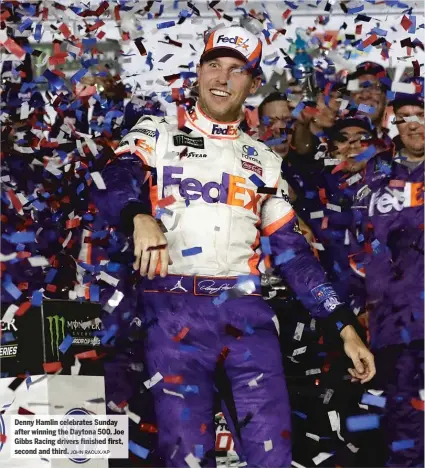  ?? JOHN RAOUX/AP ?? Denny Hamlin celebrates Sunday after winnin gt he Dayton a5 00. Joe Gibbs Racing drivers finished first, second and third.