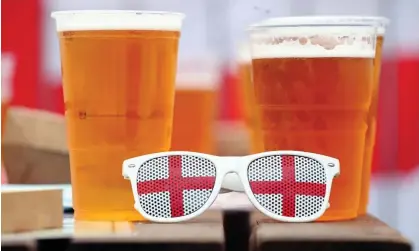  ?? ?? A couple of pints await England fans before the Euro 2020 match against Croatia at Old Trafford. Photograph: Bradley Collyer/PA