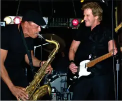  ?? Sonja Lemoi photos ?? LEFT: John Cafferty, right, and longtime Beaver Brown Band mate Michael “Tunes” Antunes are among the Rhode Island Music Hall of Fame inductees featured in the concert. Tickets are $15 in advance and $20 day of the show, with proceeds going to Tune In &amp; Tune Up, which assists the local music community with health services.