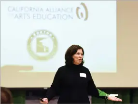  ??  ?? Robin Hampton speaks to school, community and business leaders Thursday about her own experience with arts in education at the Arts Education Networking Breakfast event.