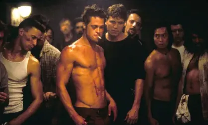  ??  ?? Brad Pitt (with cigarette) in David Fincher’s film of Fight Club (1999). Photograph: 20th Century Fox/Allstar