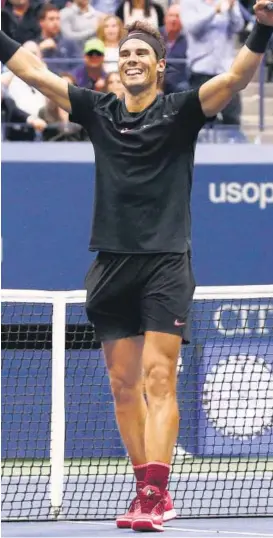  ?? AP ?? Rafael Nadal exults after beating Kevin Anderson in the men's singles final on Sunday.