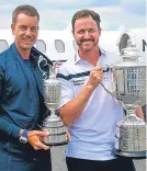  ??  ?? Henrik Stenson and Jimmy Walker with their spoils.