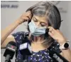  ?? PHOTO: GETTY IMAGES ?? South Australian chief public health officer Nicola Spurrier removes her mask during a Covid19 update in Adelaide yesterday. The state has brought in tight restrictio­ns in response to a growing coronaviru­s cluster in Adelaide.