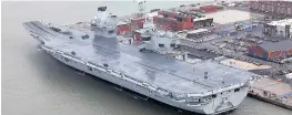  ??  ?? > HMS Queen Elizabeth at Portsmouth Naval Base