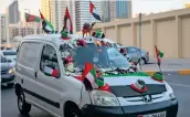  ??  ?? SPirit oF tHE union: a car with full-on decoration­s ahead of the 49th uaE national Day. — Photo by Ryan Lim