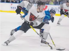  ?? JACQUES BOISSINOT/ THE CANADIAN PRESS ?? Team North America’s Connor McDavid plays against Team Europe’s Roman Josi during a tune-up game leading to the World Cup of Hockey. McDavid will play on a line with Auston Matthews when tournament play begins today in Toronto.