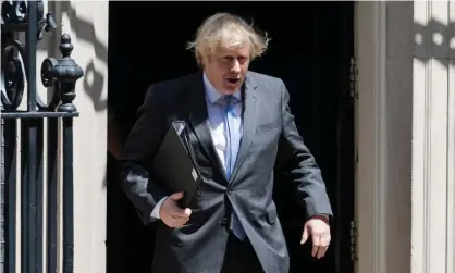  ??  ?? Boris Johnson leaves 10 Downing Street for the Commons on Tuesday to deliver a statement outlining the easing of coronaviru­s restrictio­ns. Photograph: Barcroft Media/Getty Images