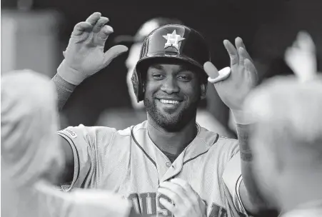  ?? Julio Cortez / Associated Press ?? During a night of offensive highlights, Astros rookie Yordan Alvarez was the star of the show with three homers and seven RBIs.