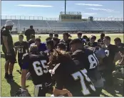  ?? DAILY DEMOCRAT ARCHIVES ?? Former Pioneer head football coach Anthony Laws speaking to his players following a 2019 practice.