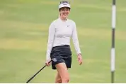  ?? Chris Carlson/Associated Press ?? Michelle Wie West walks to the 18th green during the second round of the U.S. Women’s Open golf tournament at the Pine Needles Lodge & Golf Club in Southern Pines, N.C. on June 3, 2022. Wie West is staying active by hosting a video series on female athletes and hosting an LPGA Tour event.