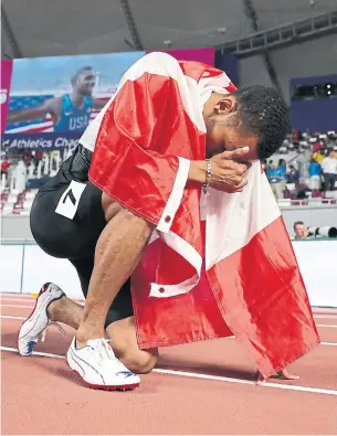  ?? HASSAN AMMAR THE ASSOCIATED PRESS ?? Andre De Grasse is the only competitor at the world track and field championsh­ips who earned medals in both the men’s 100 and 200 metres, and he still has the 4x100 relay ahead of him.