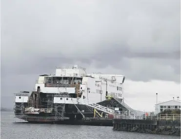  ??  ?? 0 The unfinished Glen Sannox, launched in 2017, lies at the Ferguson Marine yard on the Clyde