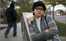  ?? AP PHOTO/CHARLES REX ARBOGAST ?? In this Nov. 3 photo, Chicago high school senior Hira Zeeshan poses for a portrait in the West Ridge neighborho­od of Chicago. Zeeshan, a Pakistani Muslim immigrant, said she’s been affected personally by the anti immigrant rhetoric that is on the rise...