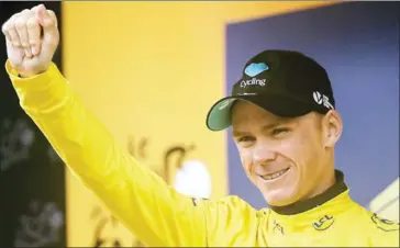  ?? AFP ?? Chris Froome celebrates on the podium at the end of the 146.5km 20th stage of the 103rd Tour de France between Megeve and Morzine-Avoriaz in the French Alps on Saturday.