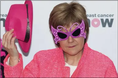  ??  ?? Colour coded: Nicola Sturgeon backing Breast Cancer Now’s Wear It Pink campaign yesterday