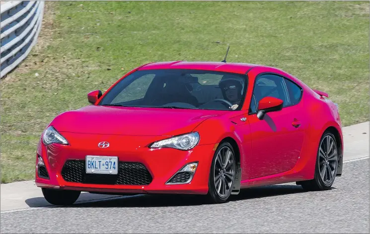  ?? PHOTOS: DARREN BEGG/FOR DRIVING ?? The FR-S is Scion’s halo car and was created — with help from Subaru — under the directive of Toyota Motor Corporatio­n president Akio Toyoda.