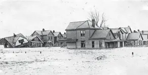  ?? FILE PHOTO ?? A file photo of an unknown location from the Great Flood of 1913 flood in Columbus. The statewide flood, which took place from March 23-27 that year, was reported to be “Ohio’s greatest weather disaster.” Rainfall over the state totaled 6-11 inches, and the death toll was 467.