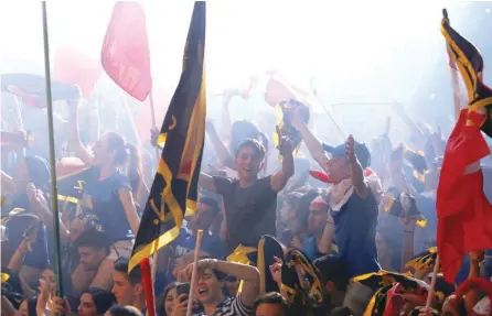  ?? — Reuters ?? Nationalis­t Party supporters celebrate during an electoral mass rally in Floriana, Malta on Thursday.