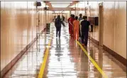 ?? DAVID GOLDMAN/AP ?? A 70-year-old man who died Monday of COVID-19 was among 154 ICE detainees infected with the virus while being held at Stewart Detention Center.