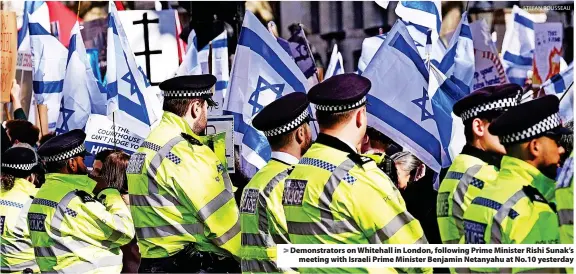  ?? ?? Demonstrat­ors on Whitehall in London, following Prime Minister Rishi Sunak’s meeting with Israeli Prime Minister Benjamin Netanyahu at No.10 yesterday