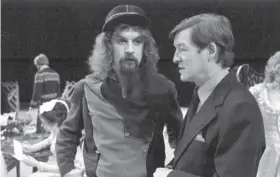  ??  ?? 0 Speaking to conductor Sir Alexander Gibson during rehearsals for the Scottish Opera production of Die Fledermaus, in which Billy Connolly played Flosch the Jailer, at the Theatre Royal in Glasgow in December 1978