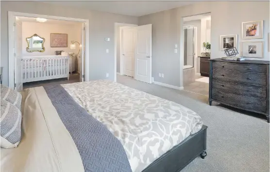  ?? MORRISON HOMES ?? The master bedroom in the Henderson show home in Symons Gate opens to a smaller space that could serve as a nursery, private retreat or even a home office.