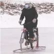  ??  ?? To stop, pedal your ice bike backward, the city says.