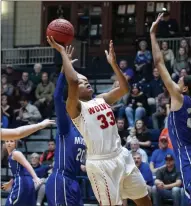  ??  ?? LEFT:
Taya Gibson goes up for a basket against the Model Lady Blue Devils during the championsh­ip game Friday night.
Photos by Steven Eckhoff, Rome News-Tribune