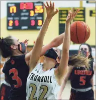  ?? Christian Abraham / Hearst Connecticu­t Media ?? Ridgefied’s Kelly Chittenden (3) knocks the ball away from Trumbull’s Julia Lindwall as she attempts a shot on Feb. 10 in Trumbull.