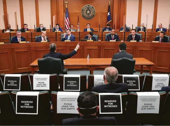  ?? Eric Gay / Associated Press ?? Kirk Morgan, at the table on the left, testifies Thursday about the winter storm blackout before the Committees on State Affairs and Energy Resources in Austin.