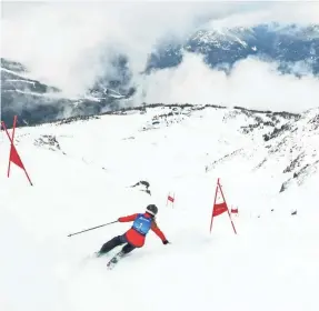  ?? MIKE CRANE/TOURISM WHISTLER ?? Sudan Couloir on Blackcomb is a double-black diamond chute that draws top skiers from around the world.