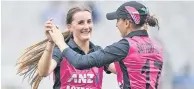  ?? Photo / Photosport ?? Rosemary Mair, of Napier, celebrates­taking a wicket with White Ferns skipper Amy Satterthwa­ite.