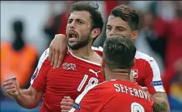  ??  ?? Screamer: Mehmedi celebrates his equaliser