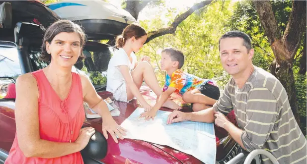  ??  ?? READY TO ROLL: Naomi Dorland, partner David Taylor and twins Oliver and Alexis, 6, plan their next trip. Picture: AAP/Claudia Baxter