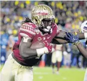  ?? LYNNE SLADKY/AP ?? Dalvin Cook had 4,464 rushing yards and scored 48 touchdowns in his three seasons with the Florida State Seminoles.