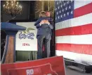  ?? ?? DeSantis gets a hug from Reynolds. Reynolds praised DeSantis’ leadership in Florida during the pandemic, his efficacy in office and his family values. Plus, she said, he’s someone “who, most importantl­y, can win.”