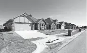  ??  ?? Home Creations built these homes on Celeste Lane in Palermo Place addition in southwest Oklahoma City.