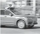  ?? MARK HENLE/THE ARIZONA REPUBLIC ?? After a fatal crash, Uber ended its self-driving car testing in Arizona.