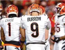  ?? Kevin C. Cox/Getty Images ?? The Bengals’ Joe Burrow deals with crowd noise at Arrowhead Stadium. He threw one touchdown pass and two intercepti­ons.