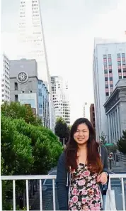  ??  ?? City explorer: Kah yee posing in front of the Transameri­ca Pyramid, the tallest building in San Francisco. Visiting its many sights has made her have a deeper appreciati­on of the city.