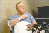  ?? LACY ATKINS/THE TENNESSEAN VIA AP ?? Burnette Chapel Church of Christ Minister David “Joey” Spann speaks to the media at the Vanderbilt University Medical Center in Nashville on Tuesday. Spann said a masked gunman shot him in the chest and hand.