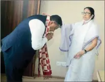  ?? FILE PIC ?? Chief Minister Mamata Banerjee greets Anit Thapa ahead of their meet in Kolkata on Wednesday