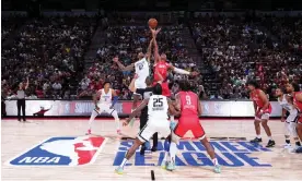  ?? Garrett Ellwood/NBAE/Getty Images ?? The opening tip-off of the Las Vegas Summer League game between the Houston Rockets and the Orlando Magic last week at the Thomas & Mack Center in Las Vegas. Photograph: