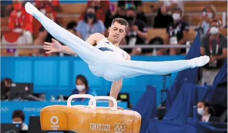  ??  ?? precision: Briton’s Max Whitlock in action during the men’s pommel horse at the ariake gymnastics Centre. — Reuters