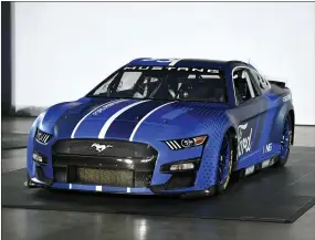  ?? MIKE MCCARN — THE ASSOCIATED PRESS ?? The 2022Next Gen Ford Mustang Cup car was unveiled during a NASCAR media event in Charlotte, N.C., on Wednesday.
