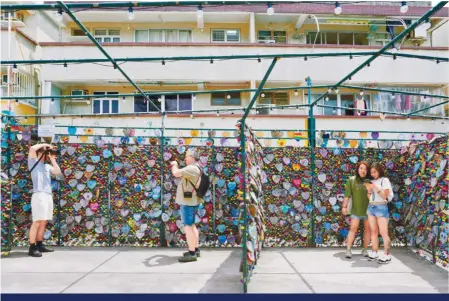  ?? Photo: May Tse ?? The “love-lock” wall on Cheung Chau is a must for savvy Instagramm­ers.