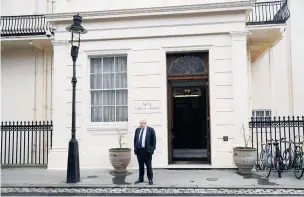  ??  ?? Boris Johnson arrived early to welcome Rex Tillerson, his US counterpar­t, to London yesterday. The pair later lavished praise on each other.