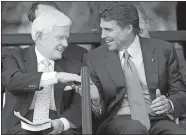  ?? HERB NYGREN/TYLER MORNING TELEGRAPH VIA AP ?? In this Sept. 18, 2005, photo, Lonnie “Bo” Pilgrim, CEO and chairman of the board of Pilgrim’s Pride Chicken, left, shakes hands with Texas Gov. Rick Perry at the Dedication Open House of the company’s new headquarte­rs in Pittsburg, Texas. Pilgrim, who...