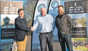  ??  ?? Left, Alistair Danter, chairman of Skye Events, celebrates the sponsorshi­p agreement with David Taylor from The Scottish Salmon Company and Mark Crowe, race director for the Isle of Skye Half Marathon.